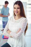 Young creative worker smiling at camera