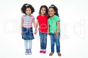 Three small girls standing together