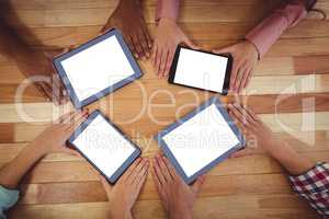 Young creative team using tablets