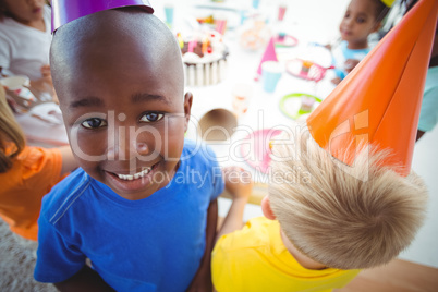 Excited kids enjoying a birthday party