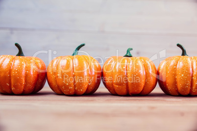 Pumpkin ornaments on desk