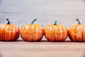 Pumpkin ornaments on desk