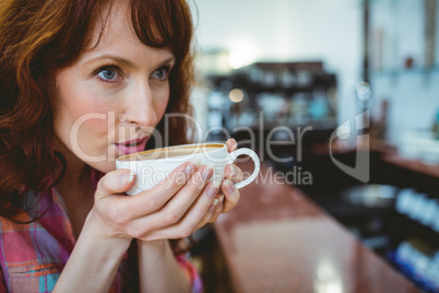 Mature student sipping her coffee