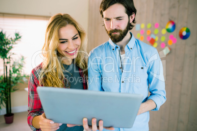 Creative team working with laptop