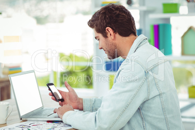 Creative businessman working on his laptop