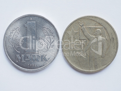 Vintage Russian ruble coin and German mark coin