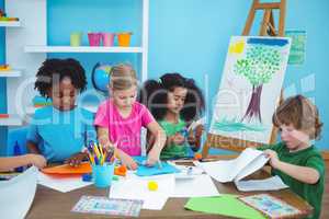 Happy kids doing arts and crafts together