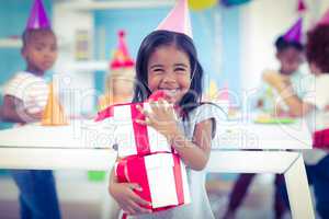 Smiling girl at birthday party