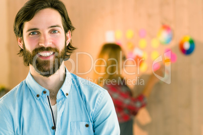 Creative man smiling at camera