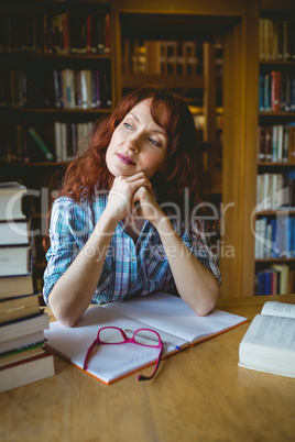 Mature student studying in library