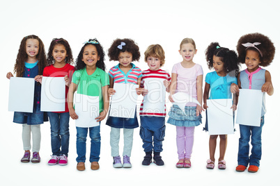 Kids standing together holding large white sheets