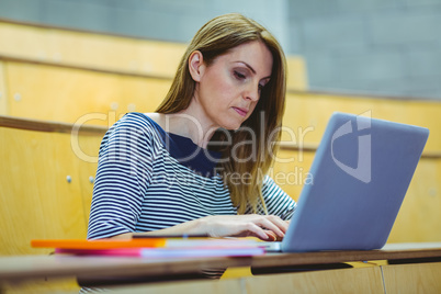 Mature student in lecture hall Mature student in lecture hall