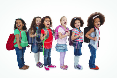 Line of schoolkids with bags