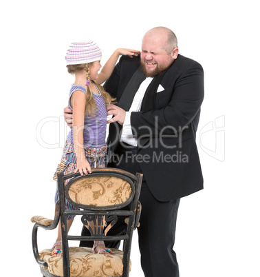 Little Girl and Servant in Tuxedo Have Fun