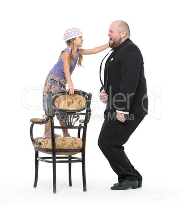 Little Girl and Servant in Tuxedo Have Fun