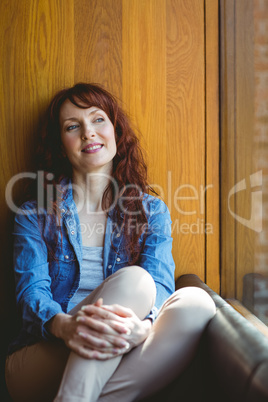 Mature student smiling in cafe