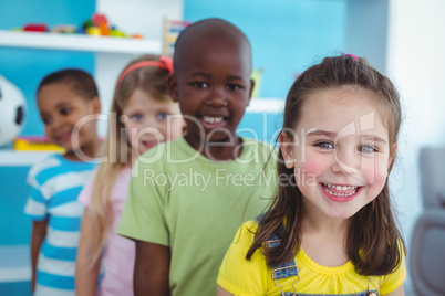 Happy kids standing in a line Happy kids standing in a line