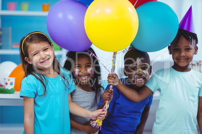 Happy kids with balloons