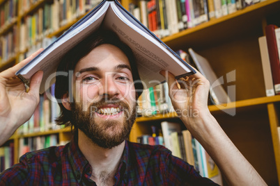 Student messing in the library