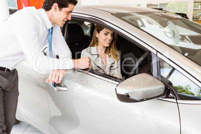 Salesman showing things to a customer