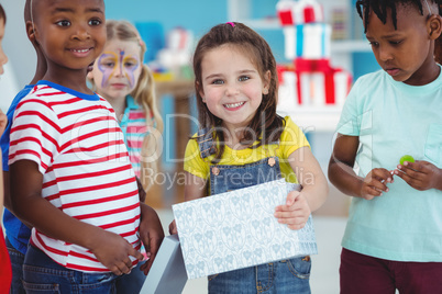 Happy girl opening a present