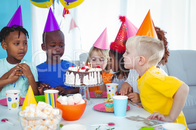 Excited kids enjoying a birthday party