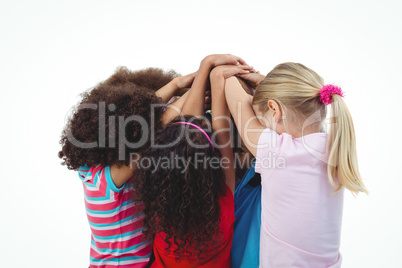 Small group of girls huddled together