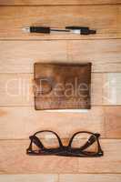 Close up view of glasses and wallet