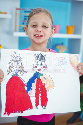 Small girl holding a lovely drawing