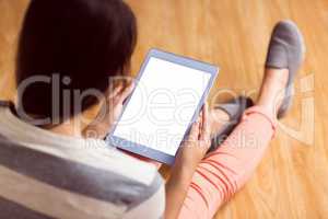 Asian woman using tablet with copy space