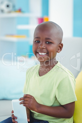 Happy boy using a smartphone