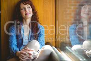 Mature student smiling in cafe