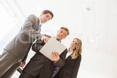 Group of smiling business team standing together