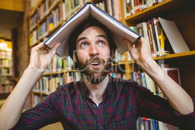 Student messing in the library