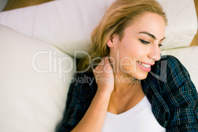 Pretty blonde relaxing on the couch