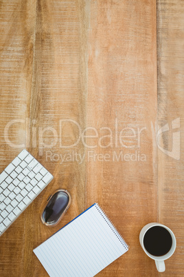 Business desk with coffee and laptop