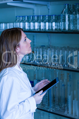 Scientist working with a tablet in laboratory