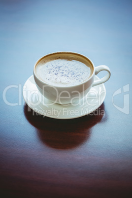 Cappuccino on table in cafe