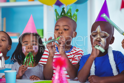 Happy kids celebrating a birthday