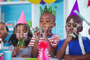 Happy kids celebrating a birthday
