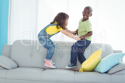 Happy boy and girl standing up