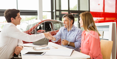 Customers signing some important documents