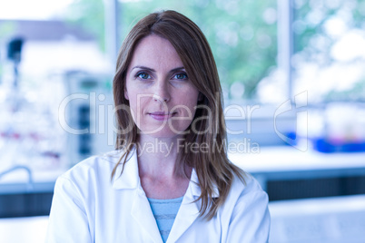 Scientist looking at camera in the laboratory