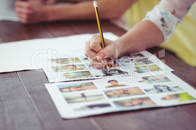 Close up of businesswoman working on documents