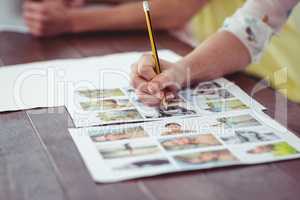 Close up of businesswoman working on documents