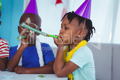 Happy kids celebrating a birthday