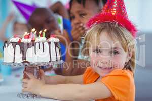 Smiling kids at a birthday party