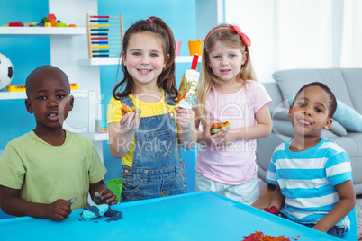 Happy kids enjoying arts and crafts together