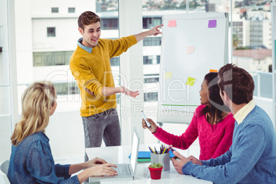 Creative businessman giving a presentation