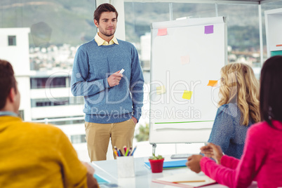 Creative businessman giving a presentation